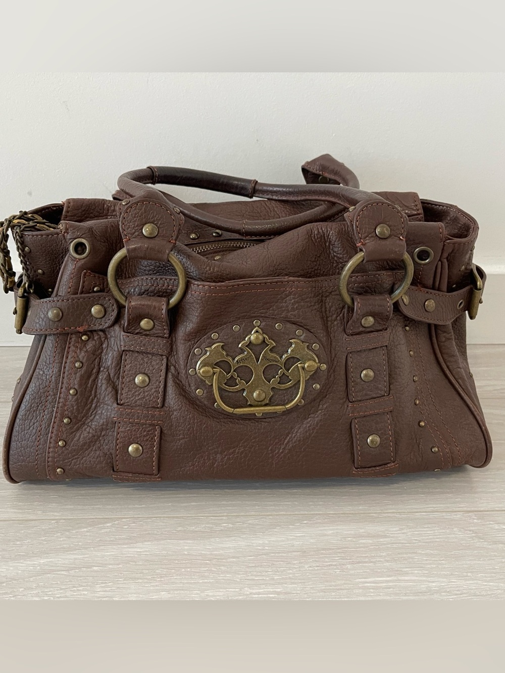 Betsey Johnson Dark Brown Leather Studded Shoulder Bag With Metal Accents.